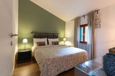 Letto o letti in una camera di EnJoy Home - Bilocale centralissimo in via Roma
