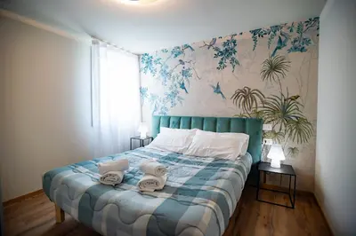 Letto o letti in una camera di La Scarpa della Strega