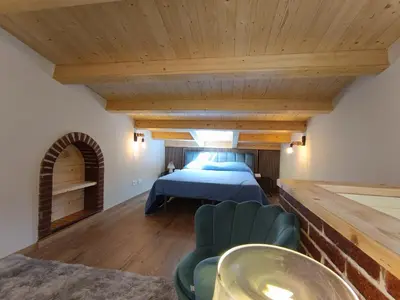 Letto o letti in una camera di La Scarpa della Strega
