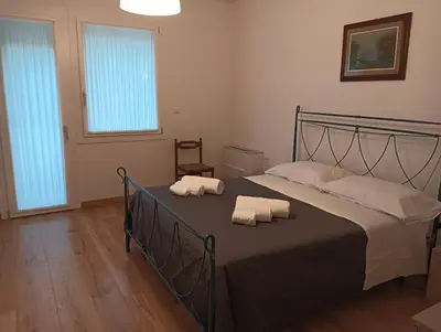 Letto o letti in una camera di Locanda vacanze da Emma