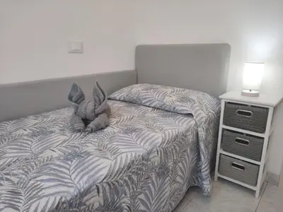 Letto o letti in una camera di Al Capitello