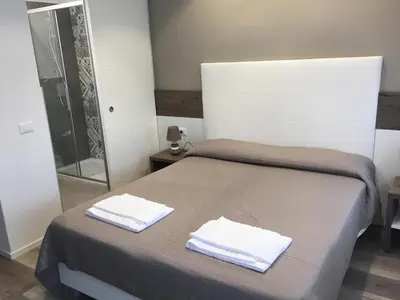 Letto o letti in una camera di Albergo Rosa