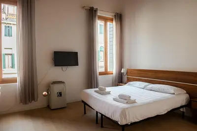 Letto o letti in una camera di Allo Squero Apartment