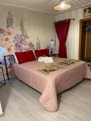 Letto o letti in una camera di Palazzo Carignano