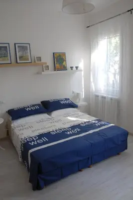 Letto o letti in una camera di Da Irene