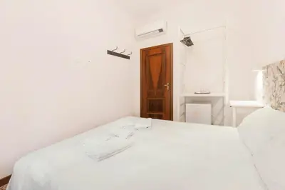 Letto o letti in una camera di Casa Alimante