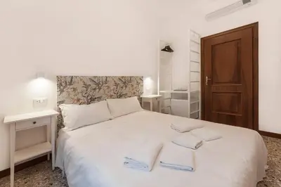 Letto o letti in una camera di Casa Alimante