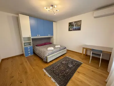 Letto o letti in una camera di Appartamento moderno Netflix & Free Parking