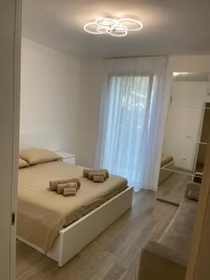 Letto o letti in una camera di Le Village Tropezien