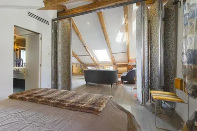 Letto o letti in una camera di PgrHome Maryloft in Cannareggio