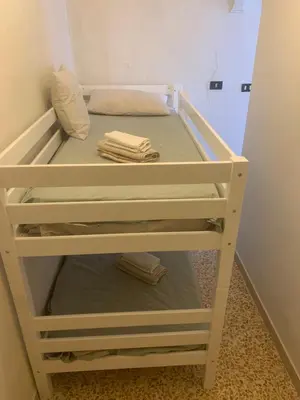 Letto o letti in una camera di Dimora Lisatti