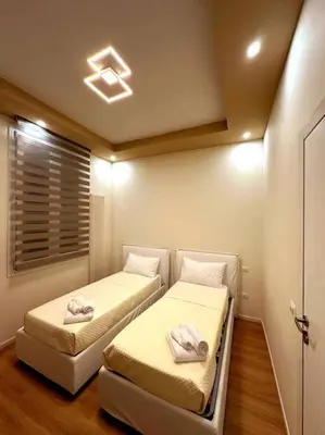 Letto o letti in una camera di Casa Chanel