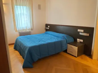 Letto o letti in una camera di Residence La Castellana