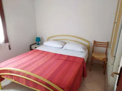 Letto o letti in una camera di Apartment in Rosolina Mare 25004