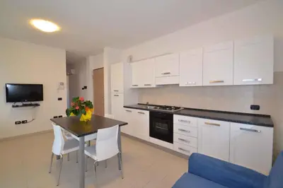 Cucina o angolo cottura di Two-Bedroom Apartment Rosolina Mare near Sea 18