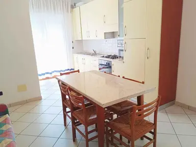 Cucina o angolo cottura di Apartments in Rosolina Mare 24930