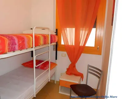 Letto o letti in una camera di Apartment in Rosolina Mare 24935