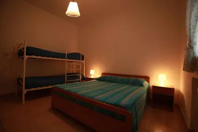 Letto o letti in una camera di Apartment in Rosolina Mare 3