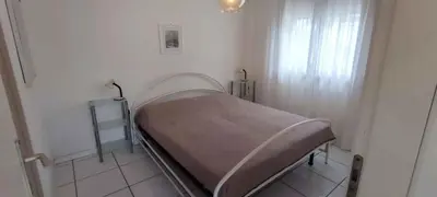 Letto o letti in una camera di Apartments in Rosolina Mare 25012