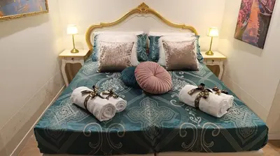 Letto o letti in una camera di Cupido Suite by Ca-Sa Check