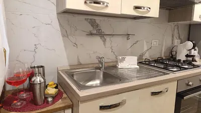 Cucina o angolo cottura di Cupido Suite by Ca-Sa Check