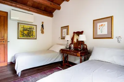 Letto o letti in una camera di Oasi Dolce Vita
