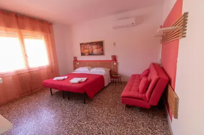 Letto o letti in una camera di GreenColors Hotel