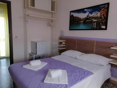 Letto o letti in una camera di GreenColors Hotel