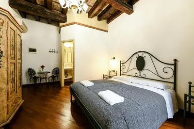 Letto o letti in una camera di Rubino's Room