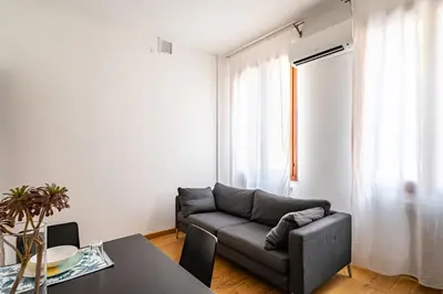 Area soggiorno di GuestHost - Padova Suite Isabella 500 meters from the Duomo!