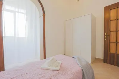Letto o letti in una camera di LE BARCHE Guest House
