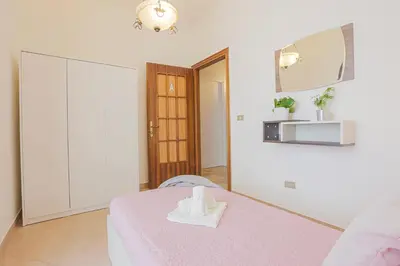 Letto o letti in una camera di LE BARCHE Guest House