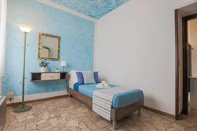 Letto o letti in una camera di LE BARCHE Guest House