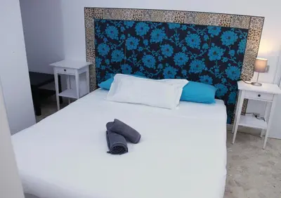 Letto o letti in una camera di Guest House Ca' Lou al Teatro