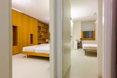 Letto o letti in una camera di San Felice Modern by Sarlux