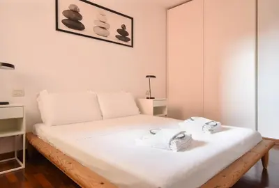 Letto o letti in una camera di Welc-ōM Padova alle Mura