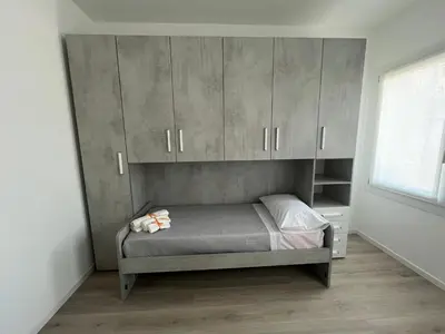 Letto o letti in una camera di House of Flowers