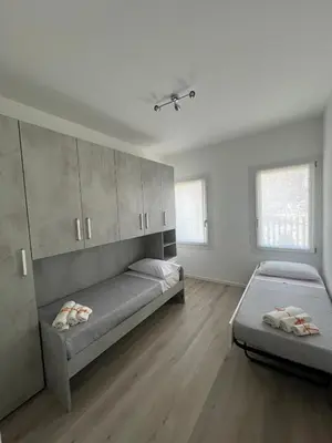 Letto o letti in una camera di House of Flowers