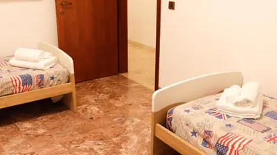 Letto o letti in una camera di Chez Regina, feel at home!