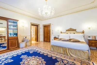Letto o letti in una camera di Hotel Ai Cavalieri di Venezia