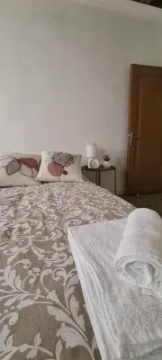 Letto o letti in una camera di Tra le Calli di Chioggia ed il mare di Sottomarina