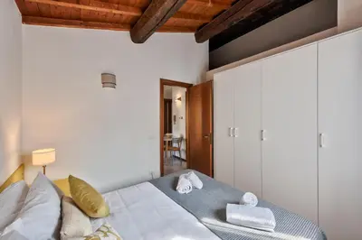 Letto o letti in una camera di La Mansarda