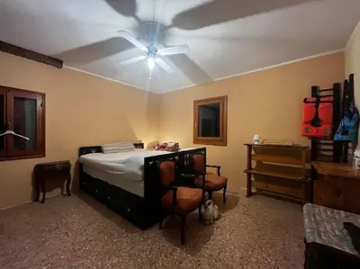 Letto o letti in una camera di Rainbow's Fisherman