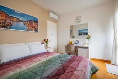 Letto o letti in una camera di Venice Friends Residence
