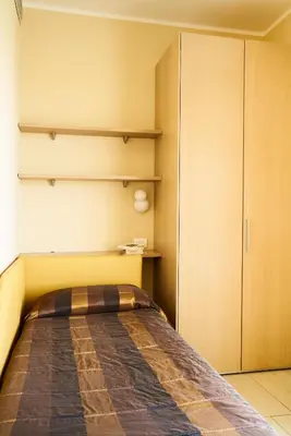 Letto o letti in una camera di Aparthotel La Pineta