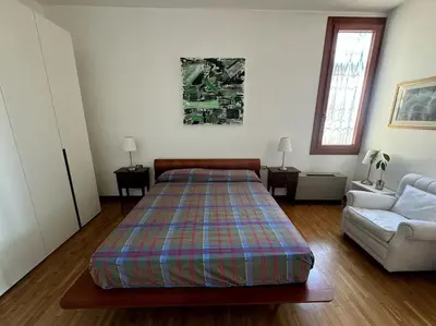 Letto o letti in una camera di Appartamento in centro storico