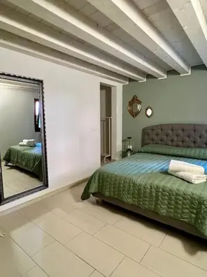 Letto o letti in una camera di Elena s Home piano primo