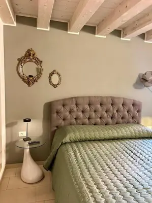 Letto o letti in una camera di Elena s Home piano primo