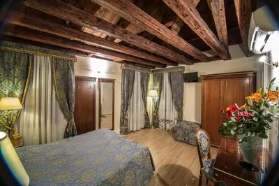 Letto o letti in una camera di B&B Le Marie