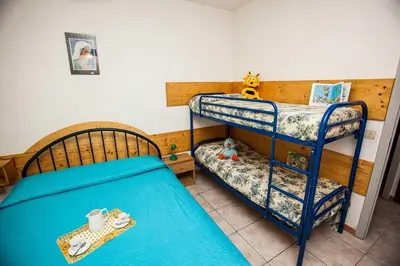 Letto o letti in una camera di Quiet little villa by the seaside in Rosolina Mare